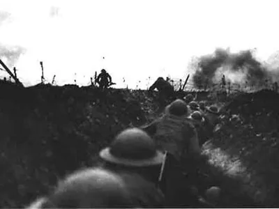 ﻿TO MOVE WITH FEATURE BC-MILLENNIUM-CENTURY-WAR - British soldiers wait in the trenches on the Western Front during the First World War as they prepare to make their way 'over the top' to face the enemy. If there is a physical frontier between the 19th and 20th centuries, it surely runs through the haunted trenches and artillery craters scarring the battlefields of World War One.CLH/ - RTRUBNS