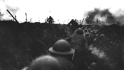 ﻿TO MOVE WITH FEATURE BC-MILLENNIUM-CENTURY-WAR - British soldiers wait in the trenches on the Western Front during the First World War as they prepare to make their way 'over the top' to face the enemy. If there is a physical frontier between the 19th and 20th centuries, it surely runs through the haunted trenches and artillery craters scarring the battlefields of World War One.CLH/ - RTRUBNS
