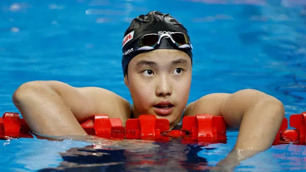 FILE PHOTO: Swimming - World Aquatics Championships - Women 400m Medley - World Aquatics Championships Arena, Singapore - August 3, 2025 China's Zidi Yu reacts at the end of heat 2 REUTERS/Tingshu Wang/File Photo