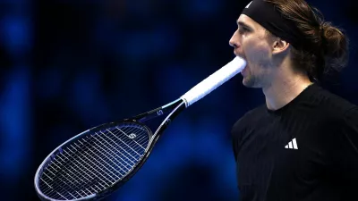 Tennis - ATP Finals - Turin - Palasport Olimpico, Turin, Italy - November 12, 2025 Germany's Alexander Zverev reacts during his group stage match against Italy's Jannik Sinner REUTERS/Guglielmo Mangiapane   TPX IMAGES OF THE DAY