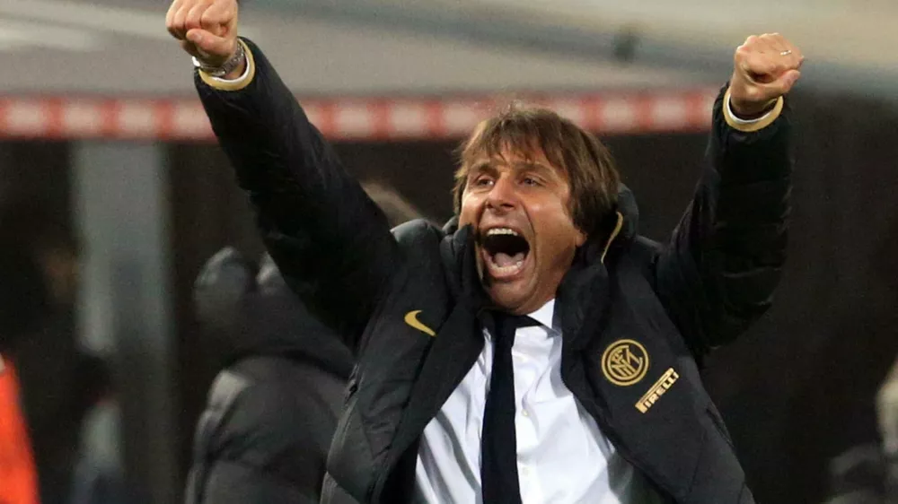 ﻿Inter coach Antonio Conte celebrates his team's victory at the end of the Italian Serie A soccer match between Bologna and Inter Milan at the Renato Dall'Ara stadium in Bologna, Italy, Saturday, Nov. 2, 2019. (Giorgio Benvenuti/ANSA via AP)
