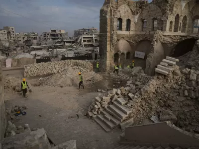Workers from the Centre for Cultural Heritage Preservation are carrying out restoration work and searching for missing artifacts at the historic Pasha Palace in Gaza City after an Israeli airstrike badly damaged the building during the war in the Gaza Strip, Thursday, Nov. 13, 2025. (AP Photo/Jehad Alshrafi)