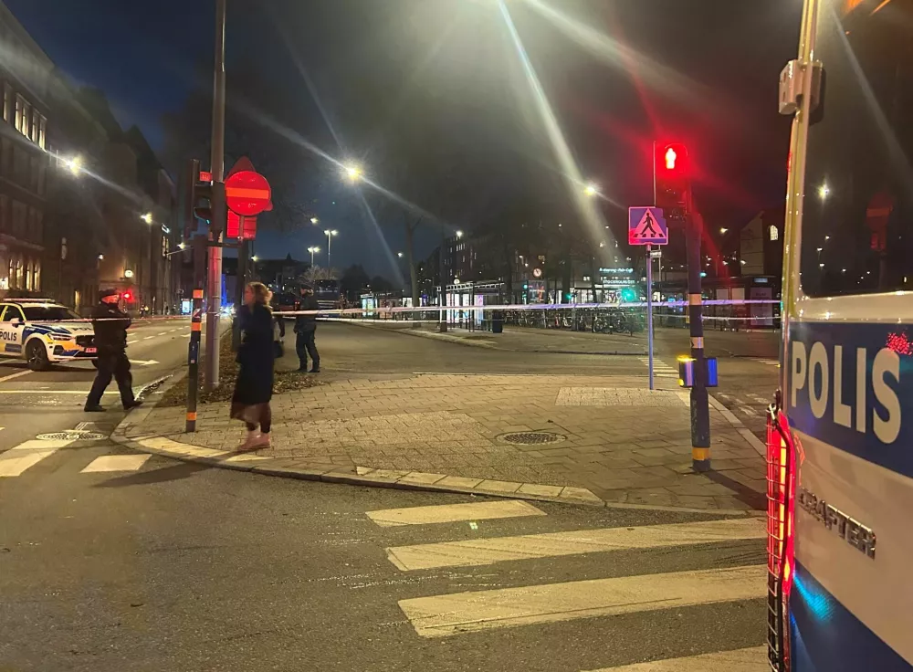 A Swedish police car stands near the site where a bus hit a bus stop in central Stockholm, Sweden, November 14, 2025. REUTERS/Marie Mannes