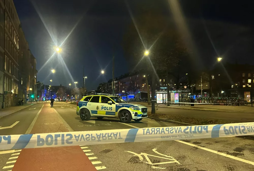 A Swedish police car stands near the site where a bus hit a bus stop in central Stockholm, Sweden, November 14, 2025. REUTERS/Marie Mannes