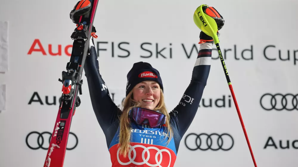 United States' Mikaela Shiffrin celebrates on the podium after winning an alpine ski, women's World Cup slalom, in Levi, Finland, Saturday, Nov. 15, 2025. (AP Photo/Marco Trovati)