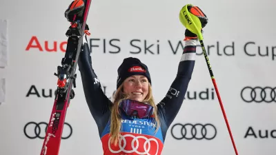 United States' Mikaela Shiffrin celebrates on the podium after winning an alpine ski, women's World Cup slalom, in Levi, Finland, Saturday, Nov. 15, 2025. (AP Photo/Marco Trovati)