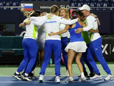 Slovenia team members celebrate Kaja Juvan Slovenia Match win during 2nd Match of 2025 Billie jean king cup play-off between the India vs Netherlands vs Slovenia held at the s.m. Krishna tennis stadium in Bangalore, India on the 15th November 2025Slovenija, tenis, Indija, pokal Billie Jean King, slavjePhoto by Rahul Goyal / ITF for the BJKCUP 