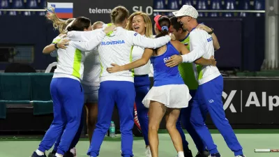 Slovenia team members celebrate Kaja Juvan Slovenia Match win during 2nd Match of 2025 Billie jean king cup play-off between the India vs Netherlands vs Slovenia held at the s.m. Krishna tennis stadium in Bangalore, India on the 15th November 2025Slovenija, tenis, Indija, pokal Billie Jean King, slavjePhoto by Rahul Goyal / ITF for the BJKCUP 