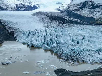 March 25, 2025, Skaftafell, Skaftafell, Iceland: An aerial view of Skaftafell Glacier. Skaftafell Glacier, part of VatnajÃ¶kull National Park in Iceland, is a stunning natural wonder characterized by its breathtaking ice formations and rugged landscapes. Skaftafell Glacier, Skaftafell, Iceland, 25th March 2025.,Image: 979375227, License: Rights-managed, Restrictions:, Model Release: no