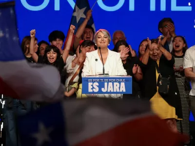 Jeannette Jara, presidential candidate of the ruling leftist-coalition and member of the Communist Party, looks on as she addresses supporters following early results in the presidential election, in Santiago, Chile November 16, 2025. REUTERS/Pablo Sanhueza