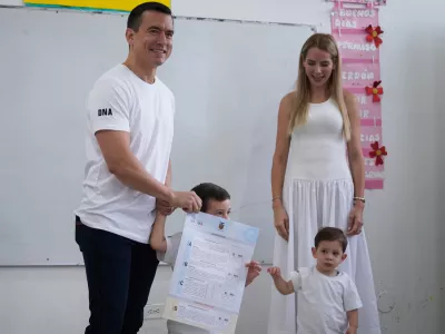 Ecuadorian President Daniel Noboa, accompanied by his family, votes in a referendum on whether to allow foreign military bases in the country and rewrite the constitution through a constituent assembly, in Olon, Ecuador, Sunday, Nov. 16, 2025. (AP Photo/Cesar Munoz)