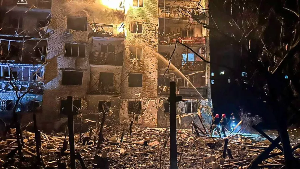 Firefighters work at the site of the apartment building hit by a Russian missile strike, amid Russia's attack on Ukraine, in the town of Balakliia, Kharkiv region, Ukraine, in this handout picture released November 17, 2025. Press service of the State Emergency Service of Ukraine in Kharkiv region/Handout via REUTERS ATTENTION EDITORS - THIS IMAGE HAS BEEN SUPPLIED BY A THIRD PARTY. MUST NOT OBSCURE LOGO.