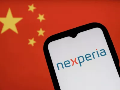 In this photo illustration, a Nexperia logo is displayed on a smartphone with a Chinese flag in the background.,Image: 1050002666, License: Rights-managed, Restrictions: *** World Rights *** Strictly for editorial news purposes only ***, Model Release: no