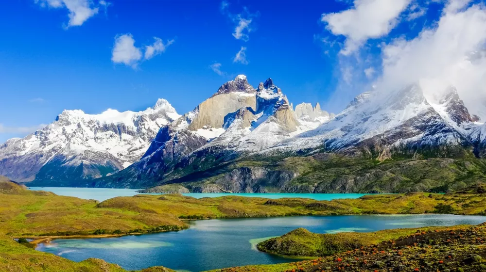 ﻿Beautiful Patagonia landscape of Andes mountain range, winding road and lake at Torres del Paine National Park, Chile.