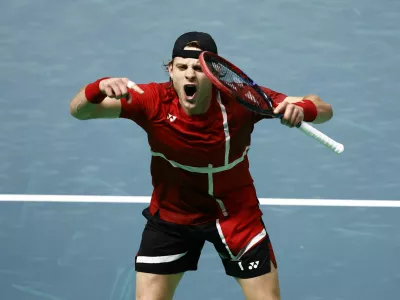 Tennis - Davis Cup - Final 8 - France v Belgium - Unipol Arena, Bologna, Italy - November 18, 2025 Belgium's Zizou Bergs celebrates winning his singles match against France's Arthur Rinderknech REUTERS/Alessandro Garofalo