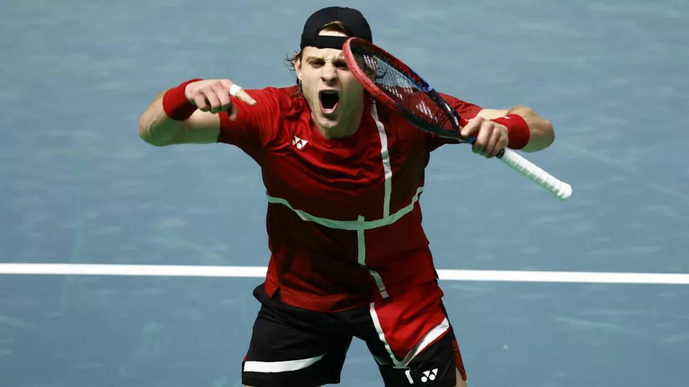 Tennis - Davis Cup - Final 8 - France v Belgium - Unipol Arena, Bologna, Italy - November 18, 2025 Belgium's Zizou Bergs celebrates winning his singles match against France's Arthur Rinderknech REUTERS/Alessandro Garofalo