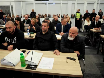 Suspects of the Pulse nightclub fire in Kocani attend a trial at the courthouse in Idrizovo, North Macedonia, November 19, 2025. Thirty seven people have been charged in connection with the fatal disco fire in Kocani in March, which killed 63 people. REUTERS/Valdrin Xhemaj
