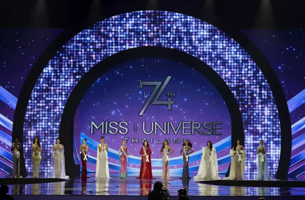 The top twelve contestants, Olivia Yace of Cote d'Ivoire, Julia Cluett of Malta, Praveenar Singh of Thailand, Ahtisa Manalo of Philippines, Zhao Na of China, Stephany Abasali of Venezuela, Zashely Alice Rivera of Puerto Rico, Fatima Bosch of Mexico, Ophely Mezino of Guadeloupe, Lina Luaces of Cuba, Vanessa Pulgarin of Colombia, and Maria Ignacia Moll of Chile, take part in the 74th Miss Universe pageant in Bangkok, Thailand, November 21, 2025. REUTERS/Chalinee Thirasupa