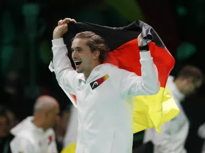 Tennis - Davis Cup - Final 8 - Argentina v Germany - SuperTennis Arena, Bologna, Italy - November 21, 2025  Germany's Alexander Zverev celebrates winning the quarter final against Argentina REUTERS/Alessandro Garofalo