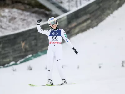 Japan's Nozomi Maruyama celebrates as she wins the women's world cup ski jumping in Lillehammer, Norway, Saturday Nov. 22, 2025. (Geir Olsen/NTB Scanpix via AP)