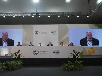 André Corrêa do Lago, COP30 president, center, speaks during a news conference at the COP30 U.N. Climate Summit, Saturday, Nov. 22, 2025, in Belem, Brazil. (AP Photo/Andre Penner)
