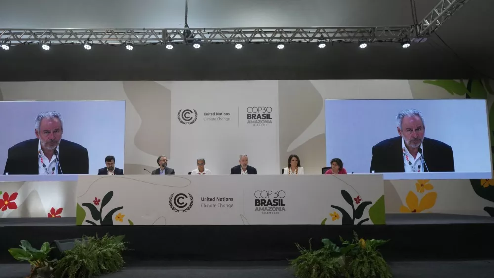 André Corrêa do Lago, COP30 president, center, speaks during a news conference at the COP30 U.N. Climate Summit, Saturday, Nov. 22, 2025, in Belem, Brazil. (AP Photo/Andre Penner)