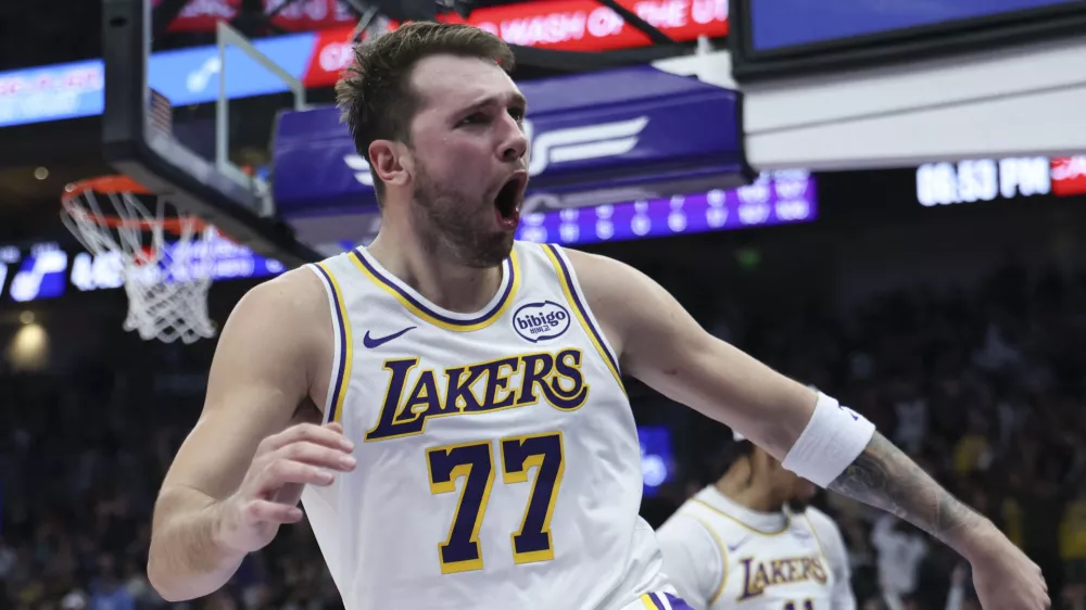 Nov 23, 2025; Salt Lake City, Utah, USA; Los Angeles Lakers guard Luka Doncic (77) reacts to a play against the Utah Jazz during the second quarter at Delta Center. Mandatory Credit: Rob Gray-Imagn Images
