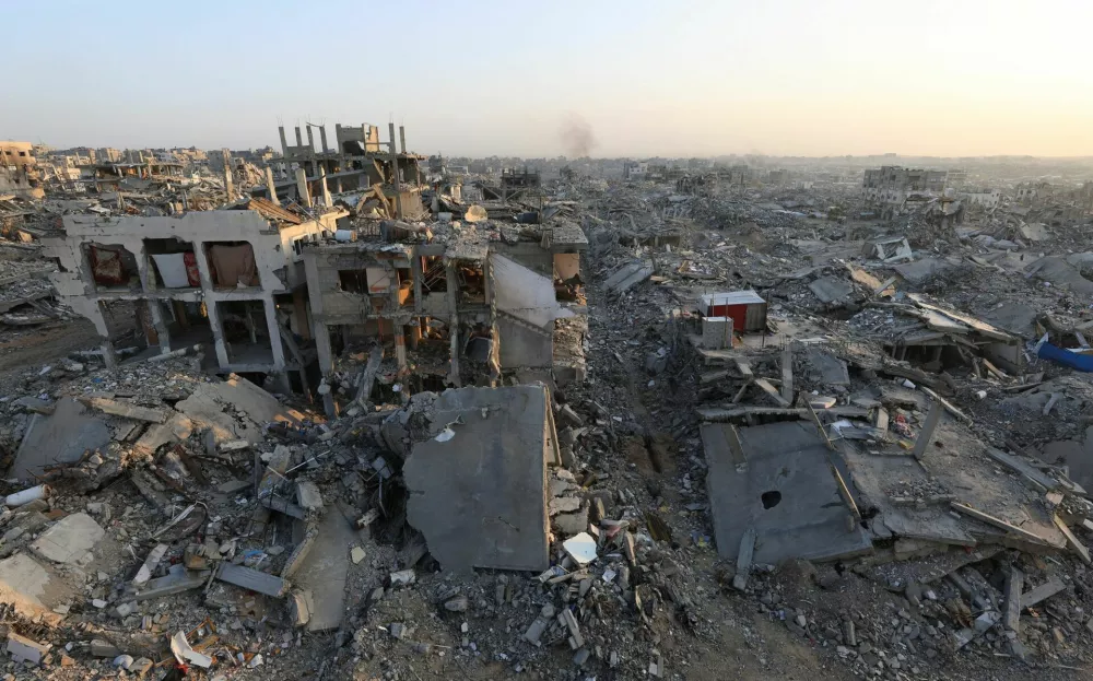 Piles of rubble and damaged buildings in Gaza City, November 24, 2025. REUTERS/Dawoud Abu Alkas