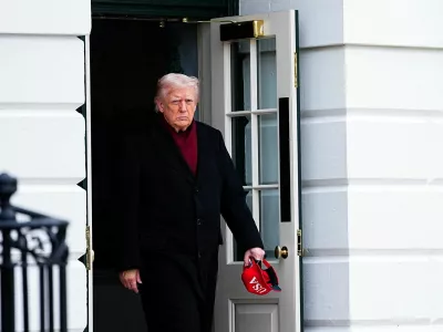 FILE PHOTO: U.S. President Donald Trump walks to board Marine One to depart for Joint Base Andrews, from the South Lawn at the White House in Washington, D.C., U.S., November 22, 2025. REUTERS/Aaron Schwartz/File Photo