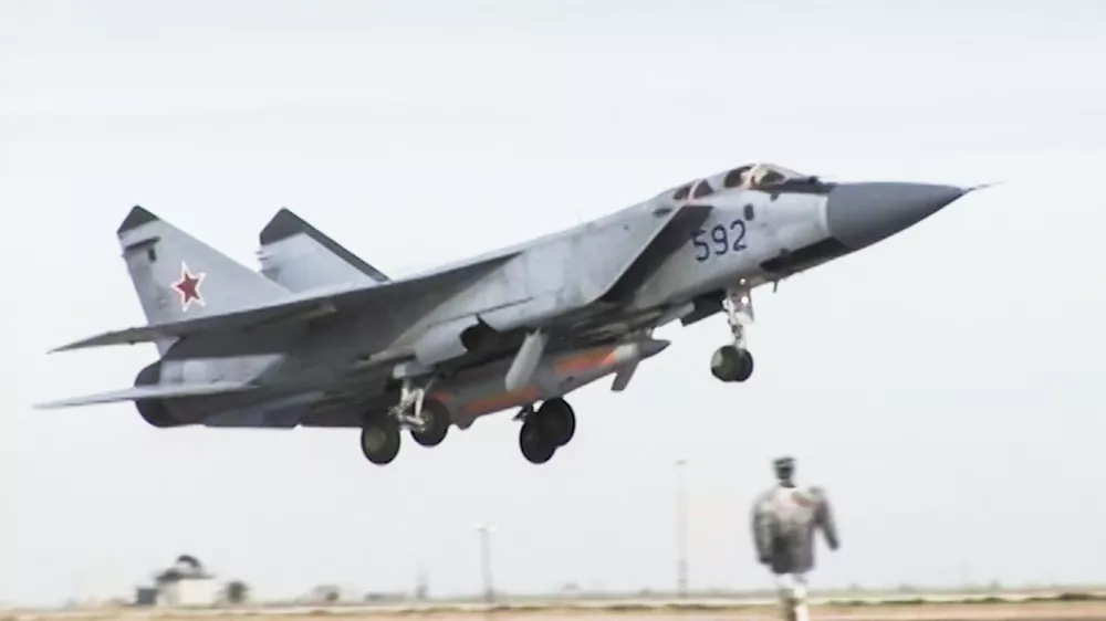 ﻿In this video grab provided by RU-RTR Russian television via AP television on Thursday, March 1, 2018, a Russian MiG-31 fighter jet carrying the new Kinzhal hypersonic missile flies at an undisclosed location in Russia. President Vladimir Putin declared Thursday that Russia has developed a range of new nuclear weapons, claiming they can't be intercepted by enemy. (RU-RTR Russian Television via AP)