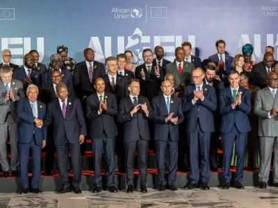 24 November 2025, Angola, Luanda: European and African leaders line up for the family photo at the end of the first day of the Africa Union (AU) - European Union (EU) Summit. Photo: Michael Kappeler/dpa