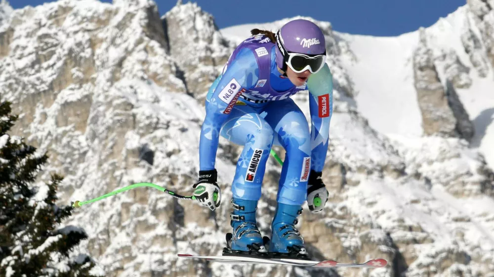 Tina Maze of Slovenia goes airborne during the second training session in the women's downhill event at the Alpine Skiing World Cup in Cortina d'Ampezzo January 18, 2013. REUTERS/Giampiero Sposito (ITALY - Tags: SPORT SKIING)
