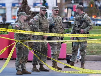 National Guard are seen after reports of two National Guard soldiers shot near the White House in Washington, Wednesday, Nov. 26, 2025. (AP Photo/Evan Vucci)