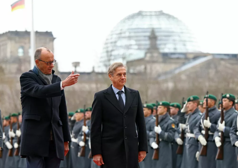 German Chancellor Friedrich Merz receives Slovenia's Prime Minister Robert Golob with military honours at the Chancellery in Berlin, Germany, November 28, 2025. REUTERS/Lisi Niesner