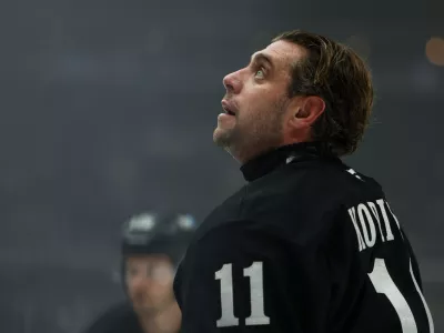 Los Angeles Kings center Anze Kopitar looks on before an NHL hockey game against the Vancouver Canucks, Saturday, Nov. 29, 2025, in Los Angeles. (AP Photo/Jessie Alcheh)