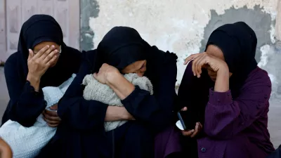 FILE PHOTO: Mourners react as they attend the funeral of Palestinians who, according to medics, were killed in Saturday's Israeli strikes, in Al-Aqsa Martyrs Hospital, in Deir al-Balah, central Gaza Strip, November 23, 2025. REUTERS/Mahmoud Issa/File Photo