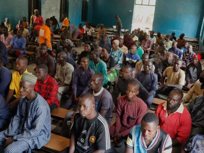 Parents of abducted School Children gather at the St. Mary's Catholic Primary and Secondary School in Papiri community, Nigeria, Friday, Nov. 28, 2025. (AP Photo)