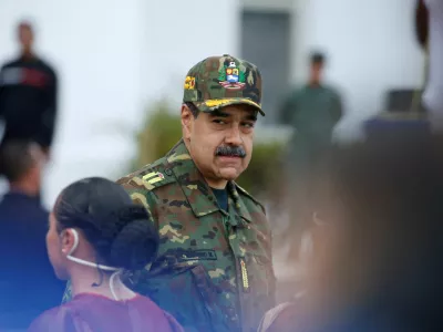 FILE PHOTO: Venezuela's President Nicolas Maduro attends a rally against a possible escalation of U.S. actions toward the country, at Fort Tiuna military base in Caracas, Venezuela, November 25, 2025. REUTERS/Leonardo Fernandez Viloria/File Photo