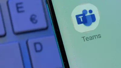 FILE PHOTO: Microsoft Teams app is seen on the smartphone placed on the keyboard in this illustration taken, July 26, 2021. REUTERS/Dado Ruvic/Illustration/File Photo