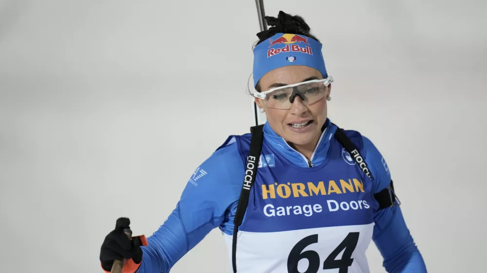 Dorothea Wierer, Italy, crosses the finish line of the Biathlon women's World Cup 15 km event, in Östersund, Sweden, Tuesday, Dec. 2, 2025. (Björn Larsson Rosvall/TT News Agency via AP)
