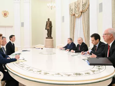 Russian President Vladimir Putin, presidential envoy Kirill Dmitriev and foreign policy aide Yuri Ushakov attend a meeting with U.S. President Donald Trump's special envoy Steve Witkoff and son-in-law Jared Kushner at the Kremlin in Moscow, Russia, December 2, 2025. Sputnik/Kristina Kormilitsyna/Pool via REUTERS ATTENTION EDITORS - THIS IMAGE WAS PROVIDED BY A THIRD PARTY.