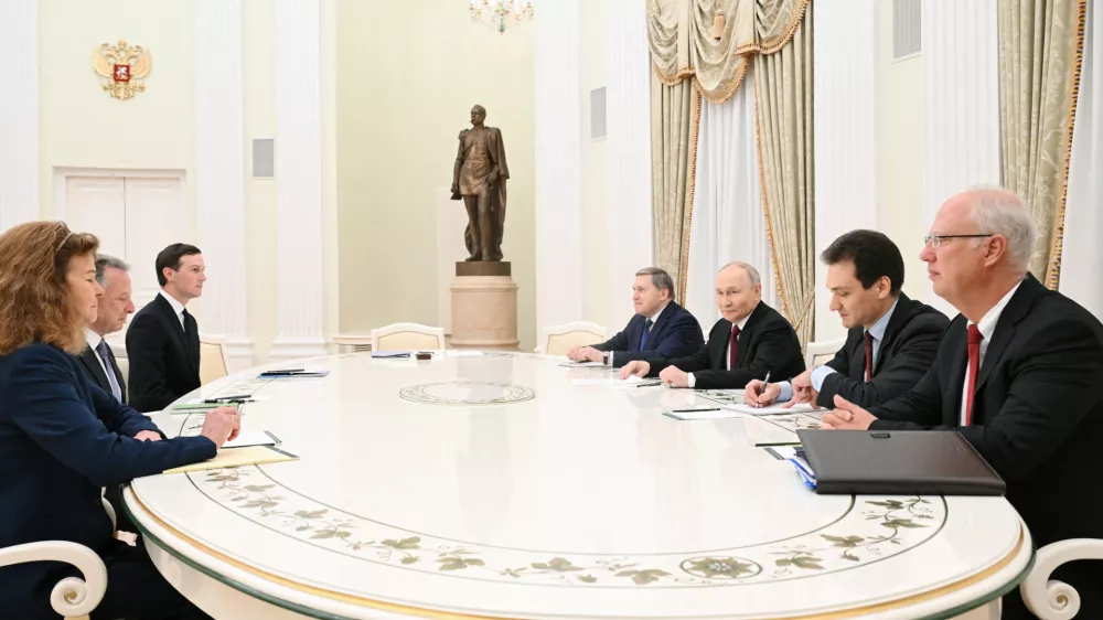 Russian President Vladimir Putin, presidential envoy Kirill Dmitriev and foreign policy aide Yuri Ushakov attend a meeting with U.S. President Donald Trump's special envoy Steve Witkoff and son-in-law Jared Kushner at the Kremlin in Moscow, Russia, December 2, 2025. Sputnik/Kristina Kormilitsyna/Pool via REUTERS ATTENTION EDITORS - THIS IMAGE WAS PROVIDED BY A THIRD PARTY.