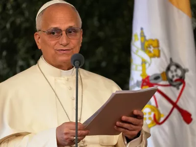 Pope Leo XIV reads a speech during a farewell ceremony at the Beirut International Airport in Beirut, Lebanon, Tuesday, Dec. 2, 12025.(AP Photo/Hussein Malla)