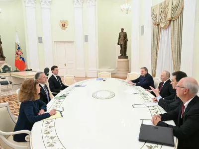 Russian President Vladimir Putin, presidential envoy Kirill Dmitriev and foreign policy aide Yuri Ushakov attend a meeting with U.S. President Donald Trump's special envoy Steve Witkoff and son-in-law Jared Kushner at the Kremlin in Moscow, Russia, December 2, 2025. Sputnik/Kristina Kormilitsyna/Pool via REUTERS ATTENTION EDITORS - THIS IMAGE WAS PROVIDED BY A THIRD PARTY.