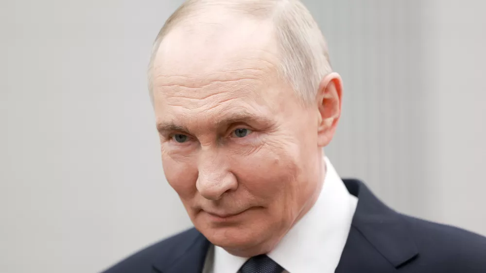 Russian President Vladimir Putin attends an international forum of civil participation "We Are Together" in Moscow, Russia, Wednesday, Dec. 3, 2025. (Alexander Shcherbak, Sputnik, Kremlin Pool Photo via AP)