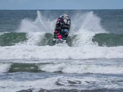 Venezuelan migrants depart Jaque on Panama's Pacific coast en route to Jurado, Colombia, as they return home after failing to enter the United States, Sept. 19, 2025. (AP Photo/Matias Delacroix, File)