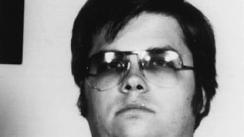 John Lennon's assassin Mark David Chapman poses for a mugshot on December 9, 1980 in New York. (Photo by Bureau of Prisons/Getty Images)