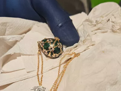 In this photo provided by the New Zealand Police a Fabergé pendant is held after it was recovered, Thursday, Dec. 4, 2025, from a man accused of stealing and swallowing the pendant. (New Zealand Police via AP)