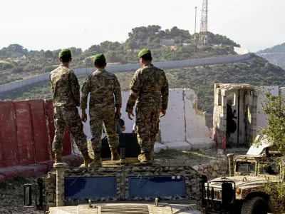 November 28, 2025, Wadi Zibqin, Wadi Zibqin, Lebanon: Lebanese soldiers look at an Israeli post opposite to their position the southern Lebanese border village in Alma al-Shaab during a media tour by the armed forces to review the operations in the southern Litani sector. The visit aimed to show the restoration of state control and disarming non-state actors in the region. This was described as a first-time event in the context of recent post-ceasefire operations. (Credit Image: © Marwan Naamani/ZUMA Press Wire)