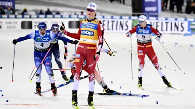 Winner Johannes Hoesflot Klaebo of Norway, Frederico Pellegrino of Italy, left, and Erik Valnes of Norway, right, compete during the men's cross-country skiing freestyle sprint final at the FIS Nordic World Cup Lahti Ski Games in Lahti, Finland, Friday, March 21, 2025. (Emmi Korhonen/Lehtikuva via AP)